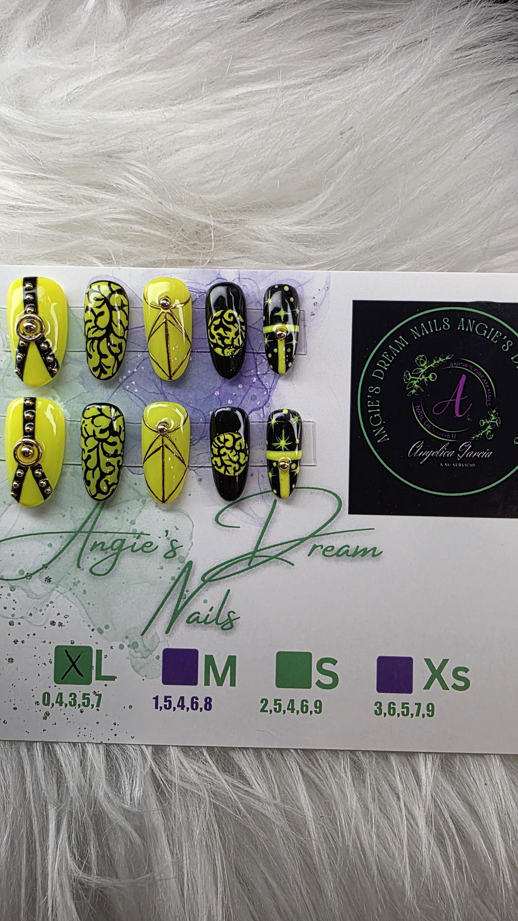 Midnight spell]medium round]press on nails]yellow and black]gold line work