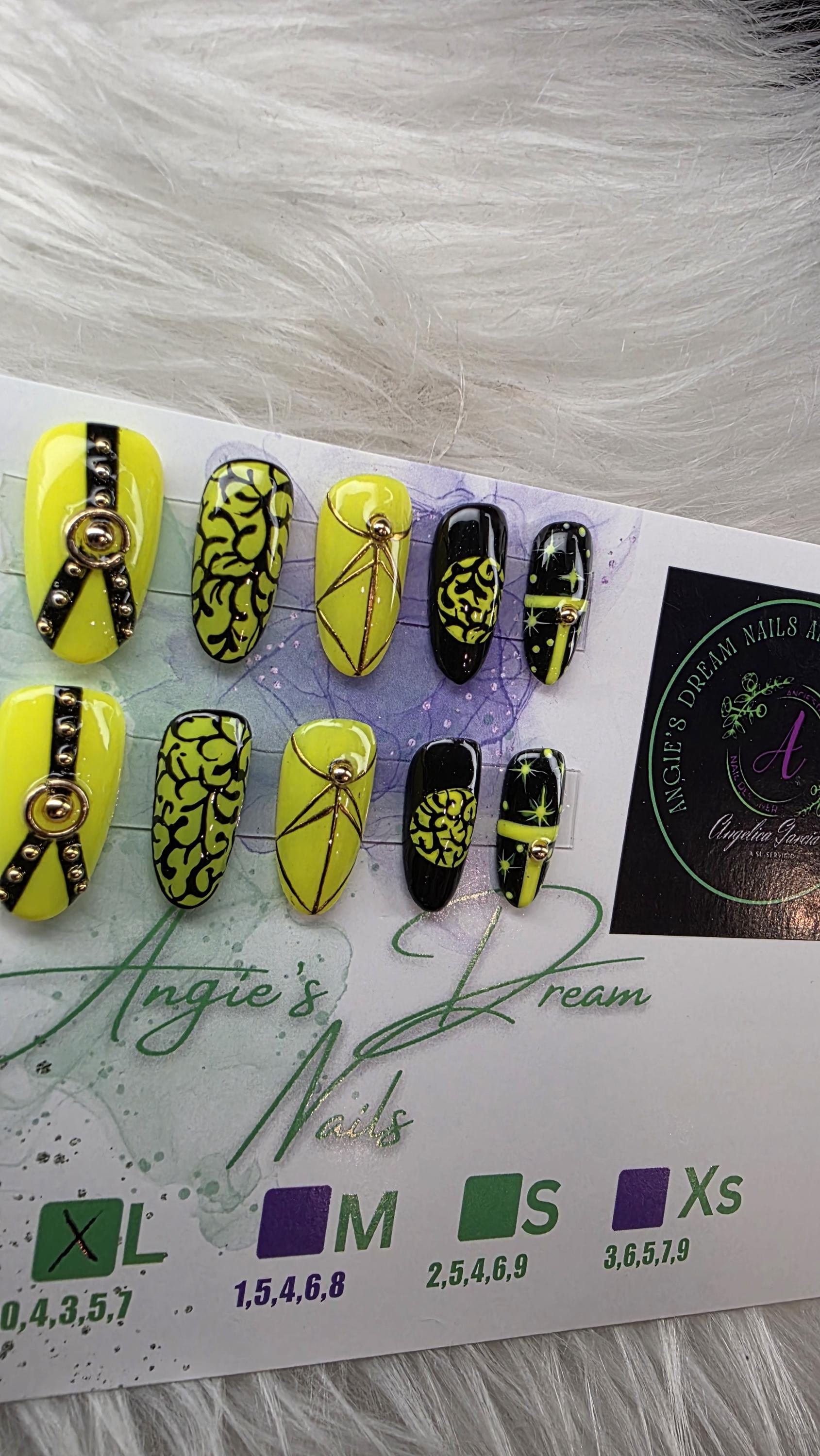 Midnight spell]medium round]press on nails]yellow and black]gold line work